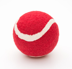 red tennis ball for pet on a white background