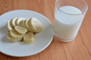 cultivated banana slice and milk glass
