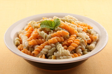 Pasta served in bowl.