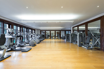 Fitness center interior. Gym - obrazy, fototapety, plakaty