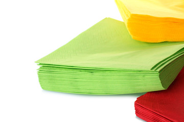 Serving colored paper napkins isolated on white background
