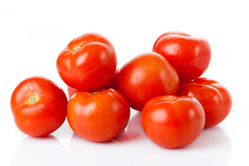 fresh tomatoes isolated on white background
