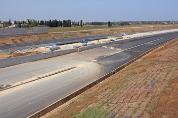 Paving a new road.
Laying of new high-speed roads in Israel.
