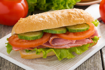 sandwich with ham and vegetables