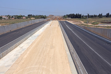 Paving a new road.
Laying of new high-speed roads in Israel.
