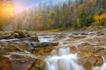mountain river in autumn at sunrise