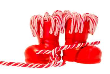 Red Santa Claus boots with candy sticks, Christmas
