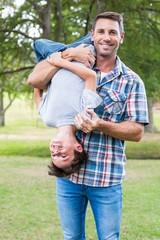 Father and son having fun in the park