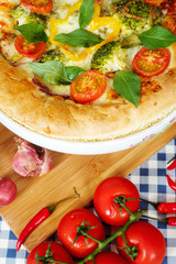 Home made vegeterian margarita pizza on table