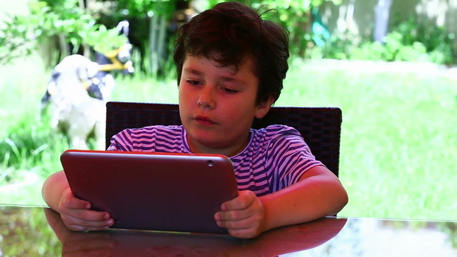 little cute child leisure time with digital tablet