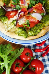 Home made vegeterian margarita pizza on table