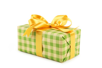 Gift box with golden bow isolated on white