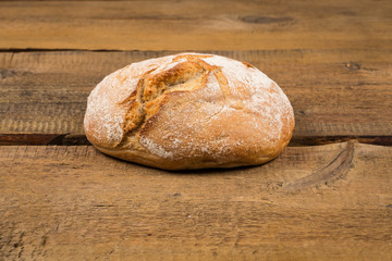 white bread over wooden background