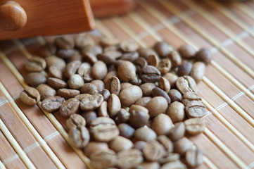 Coffee grains on a wooden cloth