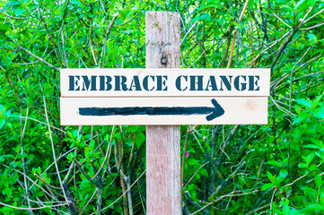 EMBRACE CHANGE Directional sign