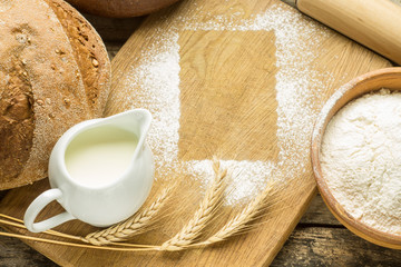 Bakery background with flour frame on board