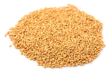 Fenugreek seeds over white background