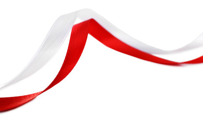 Colorful red and white ribbons isolated on white