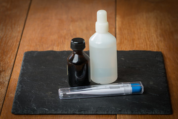 medical thermometer and bottle with medicines