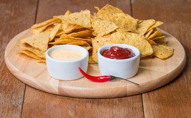 nachos with various sauces