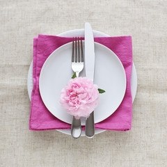 Place setting with roses