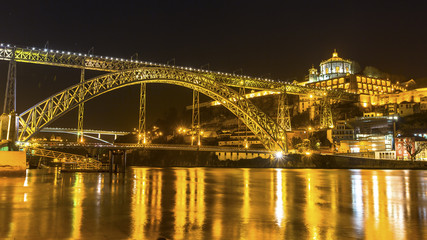 Fototapeta na wymiar Dom Luis I Bridge at night time in Old Porto, Portugal.