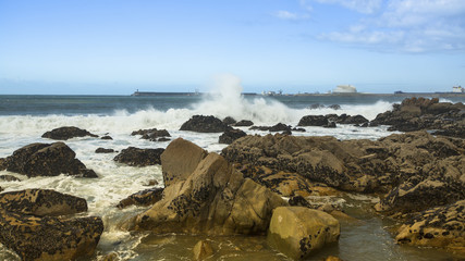 Surf at rocky Atlantic ocean coast, Portugal.