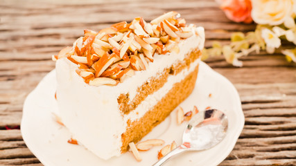Almonds cake on wooden in the vintage style