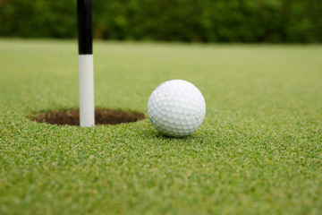 Golf ball on a putting green