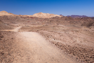 Stone desert mountains trail.