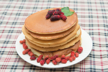 Delicious pancakes with fresh mulberry