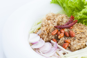 Crispy catfish salad on white dish