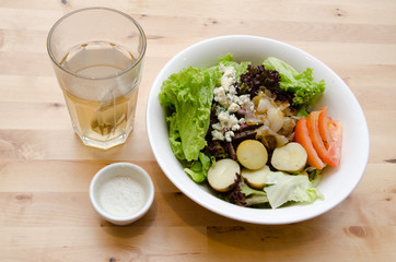 Grilled beef salad with tomato, potato, onion
