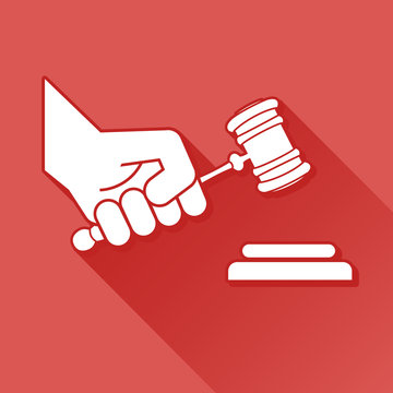 Judge gavel in hand-symbol, vector
