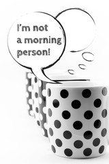 Coffee mugs with speech bubbles isolated on white background