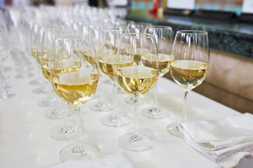 glasses with Champagne on white table