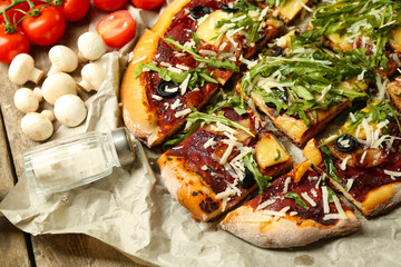 Tasty pizza with vegetables on table close up