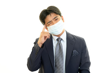 風邪に罹患した男性