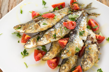 Sardine gratinate con pomodoro fresco e prezzemolo 
