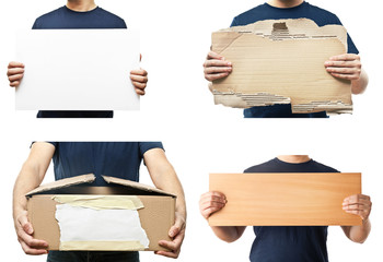 Men holding blank paper, plank, box and white poster.