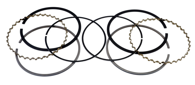 Automotive Piston Rings On A White Background