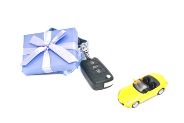 gift box, sport car and keys
