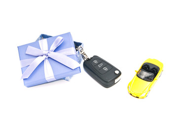 gift box, yellow car and keys