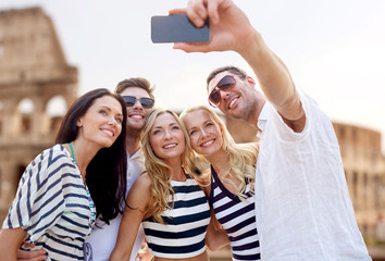 friends taking selfie with smartphone