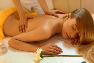 Obraz na płótnie Canvas Spa Woman. Blonde Getting Recreation Massage in Spa Salon. Welln