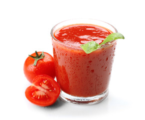 Glass of fresh tomato juice isolated on white