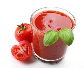 Glass of fresh tomato juice isolated on white