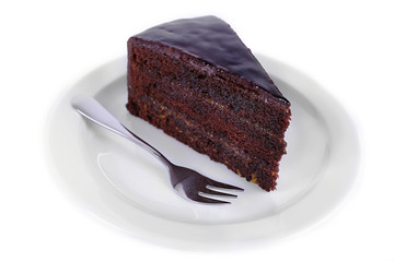 Piece of chocolate cake isolated on white