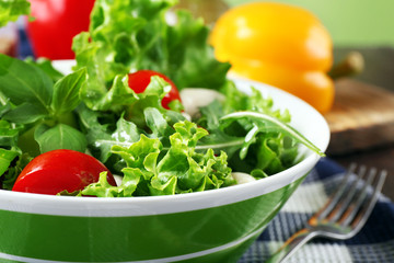 fresh vegetable salad in bowl on table close up