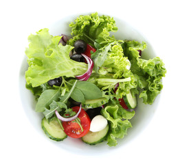 fresh vegetable salad in bowl isolated on white